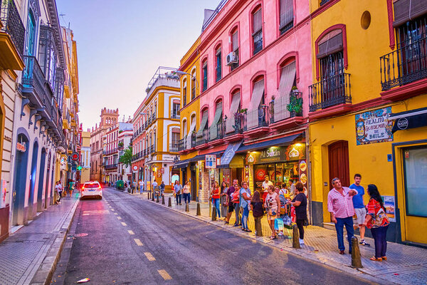 The queue at the bus stop in Seville, Spain