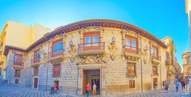 GRANADA, SPAIN - SEPTEMBER 27, 2019: Panorama of medieval Palacio de la Madraza (Madrasah Islamic school), located in Calle Oficios (La Lonja square), on September 27 in Granada