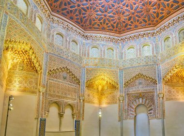 GRANADA, SPAIN - SEPTEMBER 27, 2019: Panorama of mosque in Palacio de la Madraza (Madrasah), decorated with carved dome, mocarabe (muqarnas, honeycomb), fine patterns, on September 27 in Granada