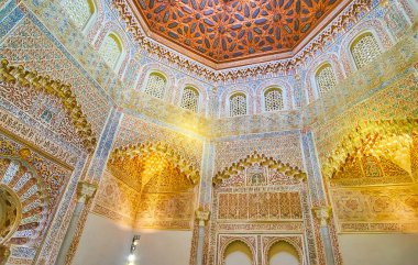 GRANADA, SPAIN - SEPTEMBER 27, 2019: Mosque of Palacio de la Madraza (Madrasah) boasts impressive Islamic patterns, sebka designs, mocarabe (muqarnas) vaulting, wooden dome, on September 27 in Granada