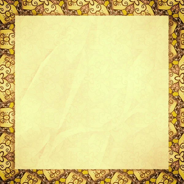 The crumpled form lies on yellow wall-paper, with an abstract sp — Stock Photo, Image