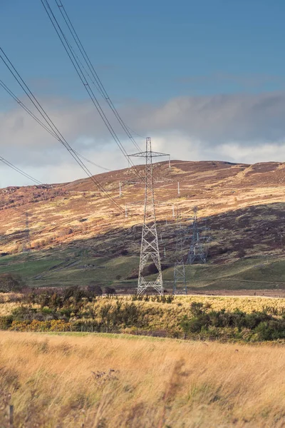 Electric power transmission steel tower with power lines in Pert