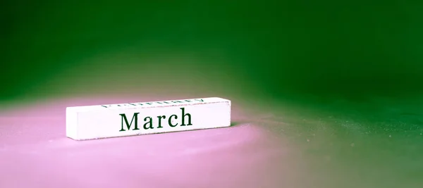 March, name of the month written on vintage white wooden block o — Stock Photo, Image