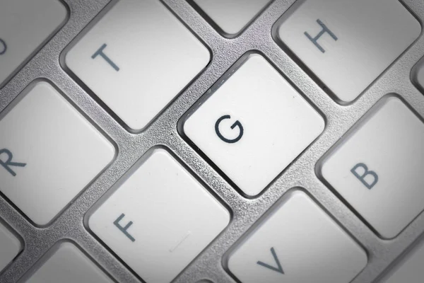 Keyboard - silver portable computer keyboard in IT department wi — Stock Photo, Image