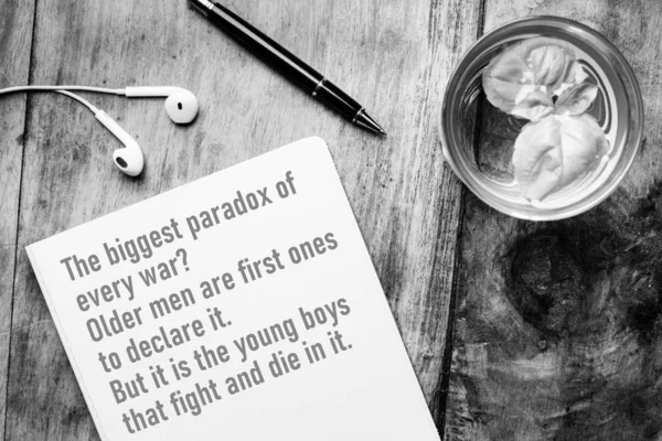 Notebook with words of wisdom about war - The biggest paradox of — 스톡 사진