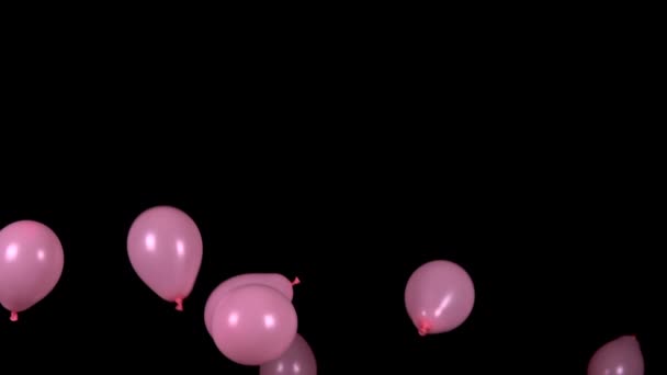 Palloncini rosa festivi decollano su uno sfondo nero. Rallentatore — Video Stock