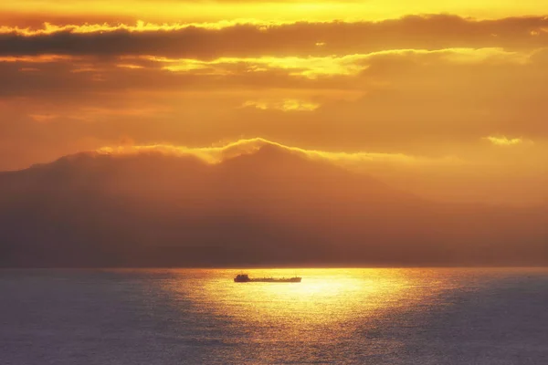 Shipping vessel at sunset — Stock Photo, Image