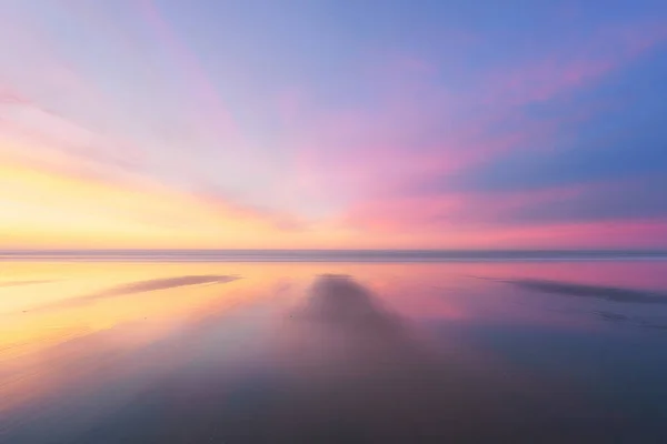Beautiful background of beach at sunset — Stock Photo, Image