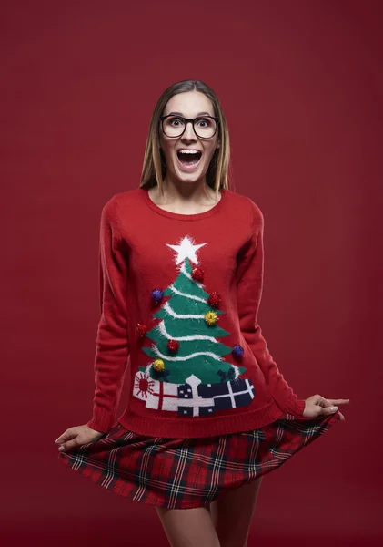 Funny girl in Christmas sweater — Stock Photo, Image