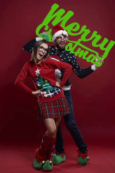 Christmas time with funny couple — Stock Photo, Image