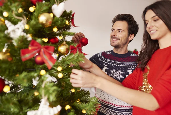 Loving couple at Christmas time — ストック写真