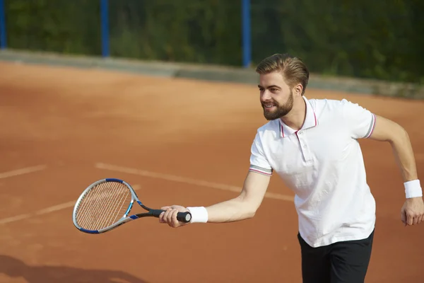 Sportsman spela tennis — Stockfoto