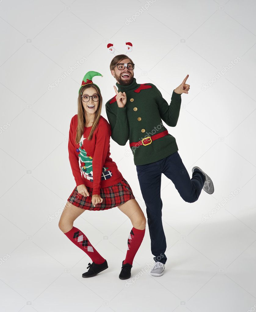 Happy couple in Christmas clothes