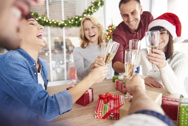 Young team having laughs while making a toast — Stock Photo, Image