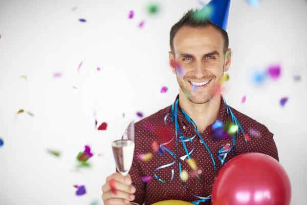 Handsome man celebrating new year — Stock Photo, Image