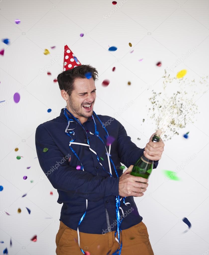Man celebrating new year — Stock Photo © gpointstudio #127404136
