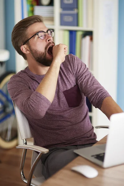 Young handsome man working at home — Stock Photo, Image