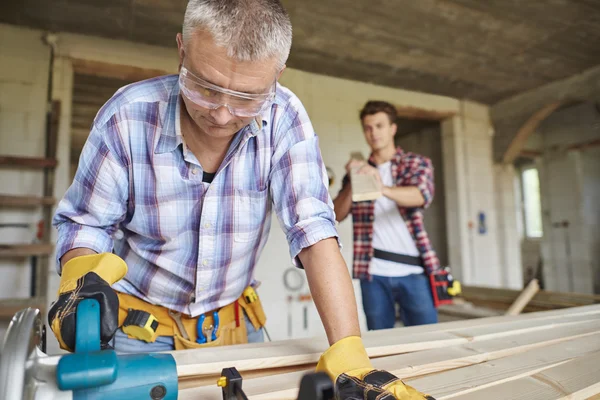 Manual workers at building object — Stock Photo, Image