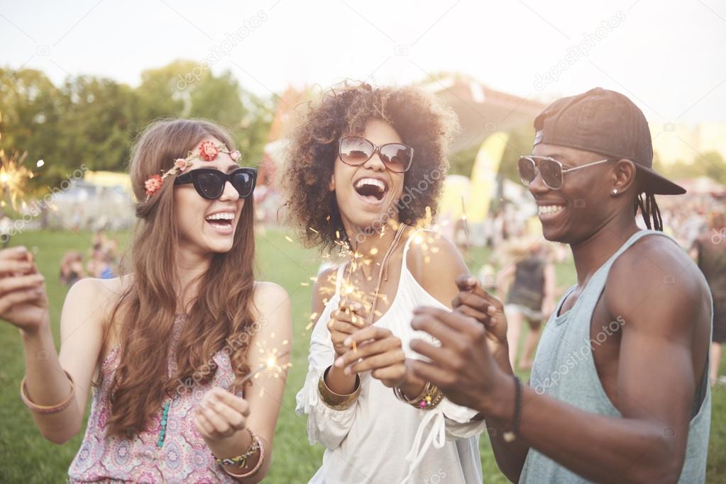 Lights of sparklers are shining in daylight  