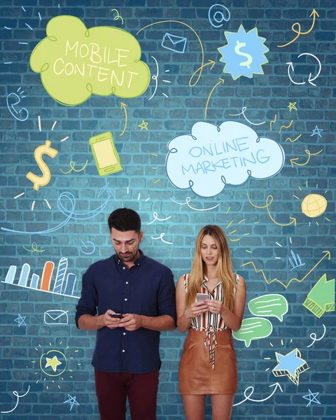 Man and woman with digital devices — Stock Photo, Image