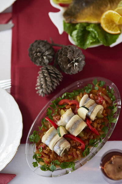 Herring rolls on Christmas table