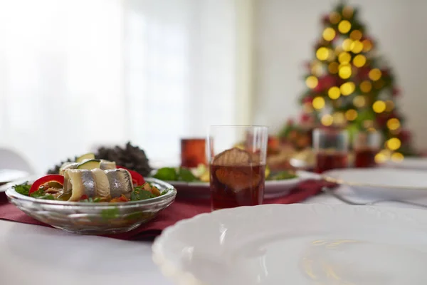 Herring rolls on Christmas table — Stock Photo, Image
