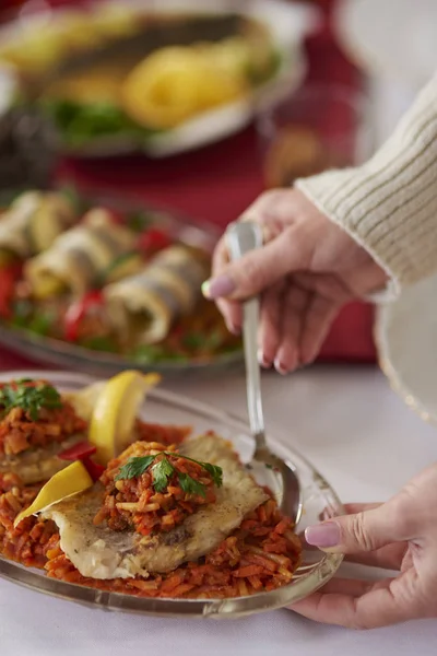 Delicious greek style fish on the plate — Stock Photo, Image