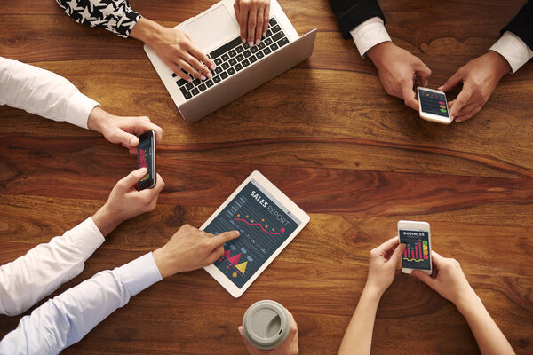 business people using digital devices