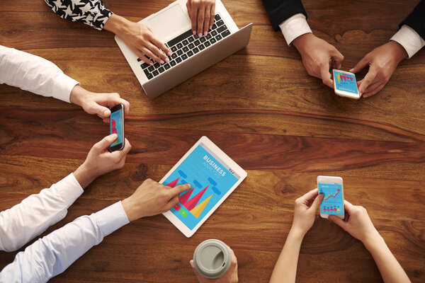 business people using digital devices