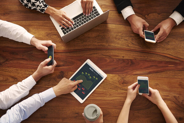 business people using digital devices