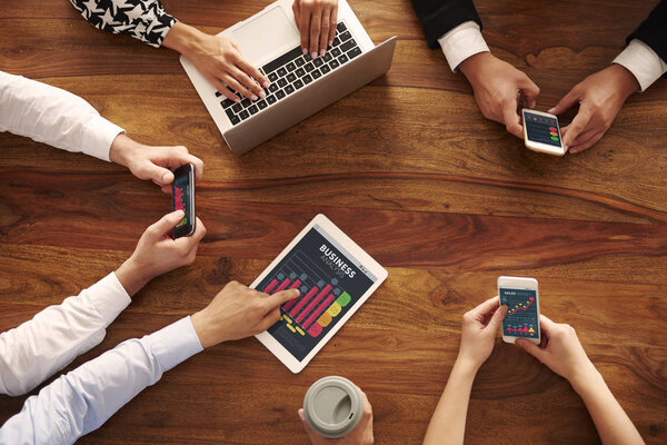 business people using digital devices