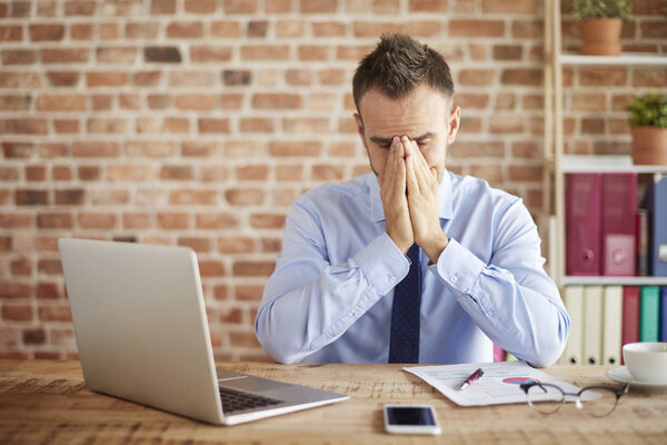 man working hard at office