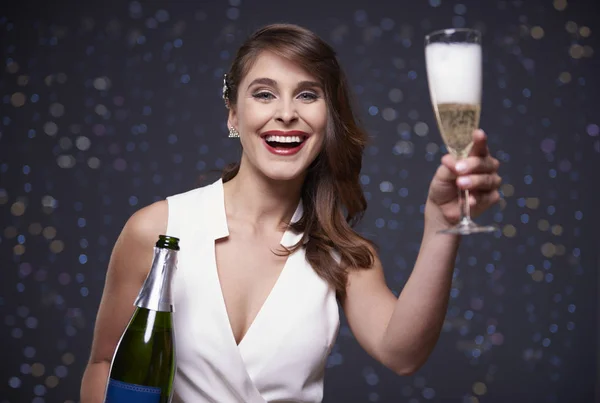 Woman holding champagne