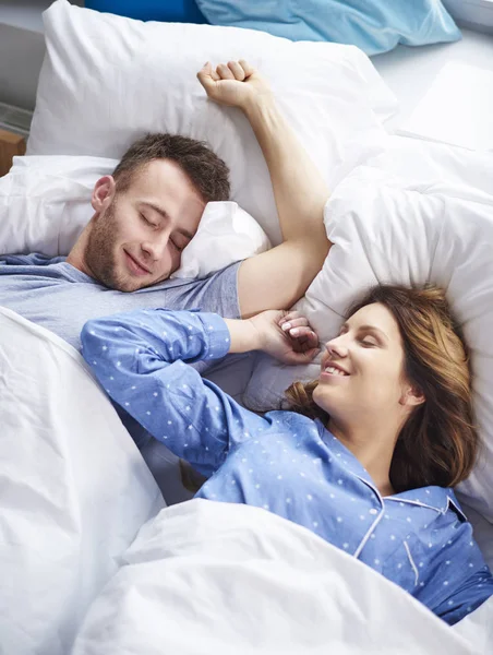 Beautiful couple in bed — Stock Photo, Image