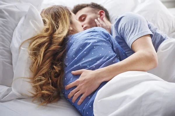Beautiful couple in bed — Stock Photo, Image