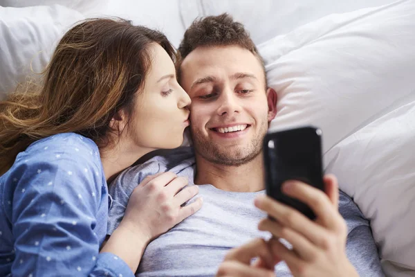 Beautiful couple in pajamas — Stock Photo, Image