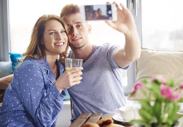 Beautiful couple in pajamas — Stock Photo, Image