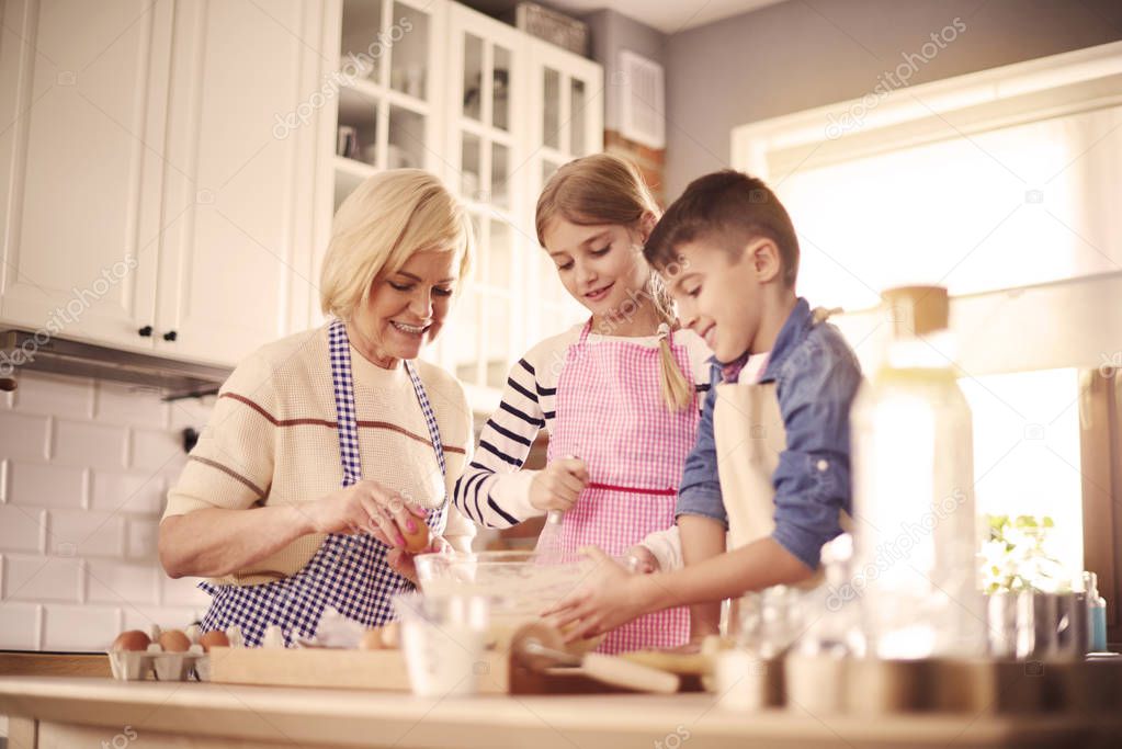 children helping grandmother