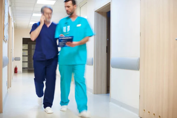 Two busy doctors — Stock Photo, Image