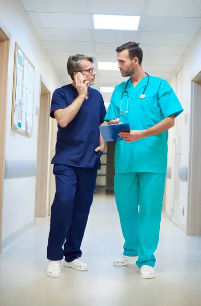 Two busy doctors — Stock Photo, Image