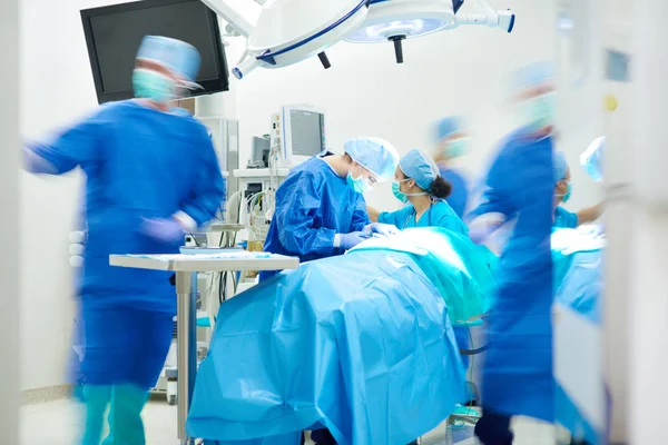 Doctors in process of surgery — Stock Photo, Image