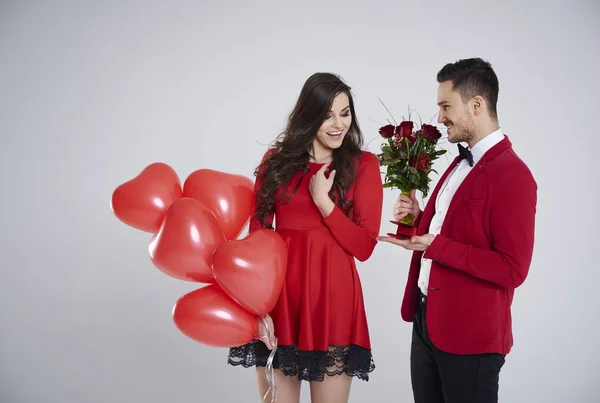 Man giving flowers — Stock Photo, Image