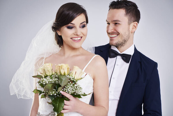 smiling bride with flowers