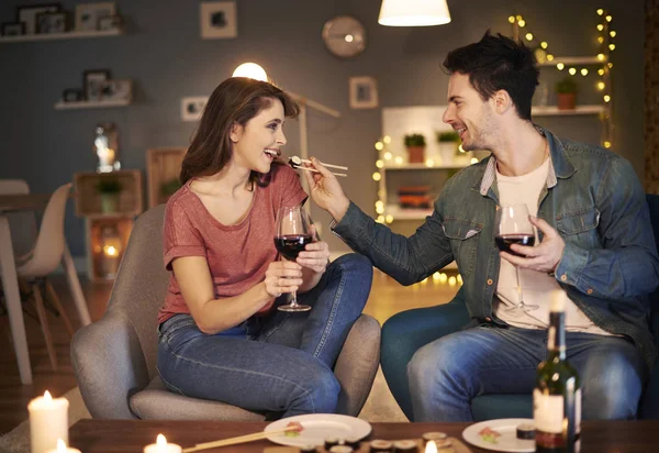 Man feeding woman — Stock Photo, Image