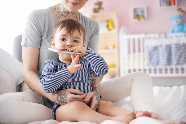 Baby playing with smartphone — Stock Photo, Image