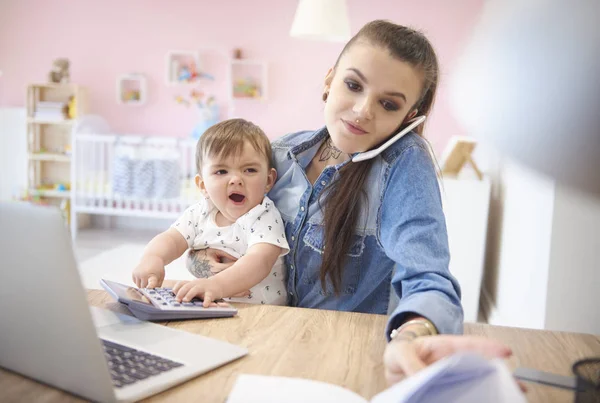 Freelancer mom with baby boy — Stock Photo, Image