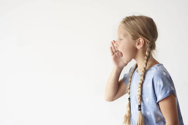 Small girl shouting on white — Stock Photo, Image