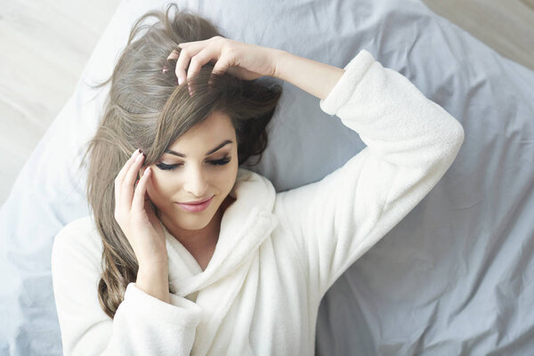 beautiful woman in bathrobe 