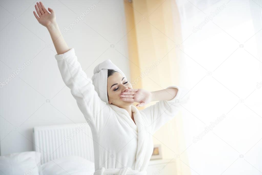 young woman waking up