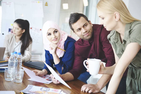 Businesspeople having conversation